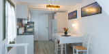 Pension_Afroditi_Apollonia_Sifnos_Cycladic_Studio_with_Terrace_1200x600_11_Kitchen & Living Room