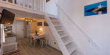 Pension_Afroditi_Apollonia_Sifnos_Cycladic_Studio_with_Terrace_1200x600_8_Kitchen & Living Room