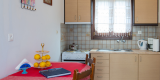 Pension_Afroditi_Apollonia_Sifnos_Double_Studio_with_Balcony_1200x600_Balcony_4_Kitchen