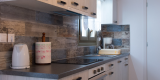 Pension_Afroditi_Apollonia_Sifnos_Cycladic_Studio_with_Terrace_1200x600_12_Kitchen & Living Room